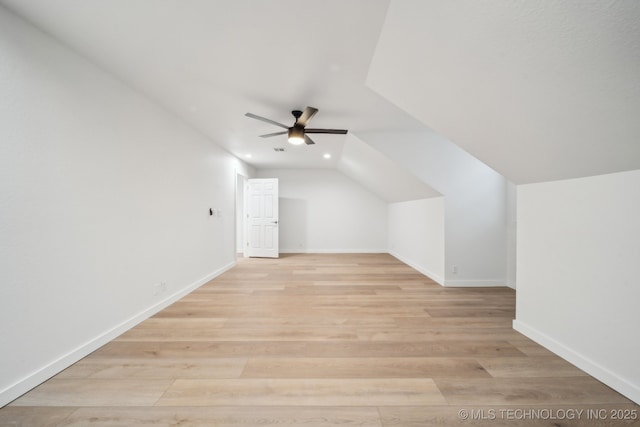 bonus room featuring vaulted ceiling, ceiling fan, and light hardwood / wood-style floors