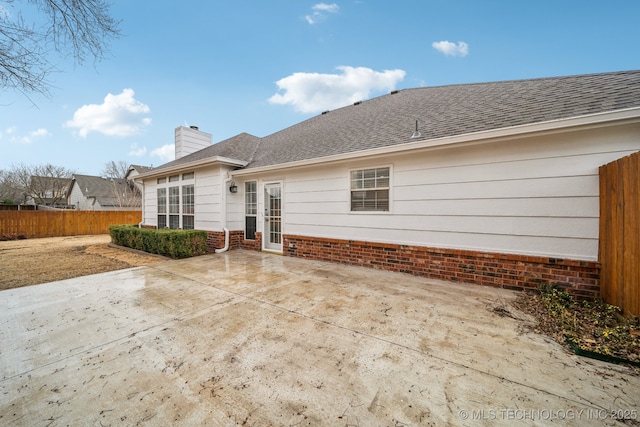 back of property featuring a patio area