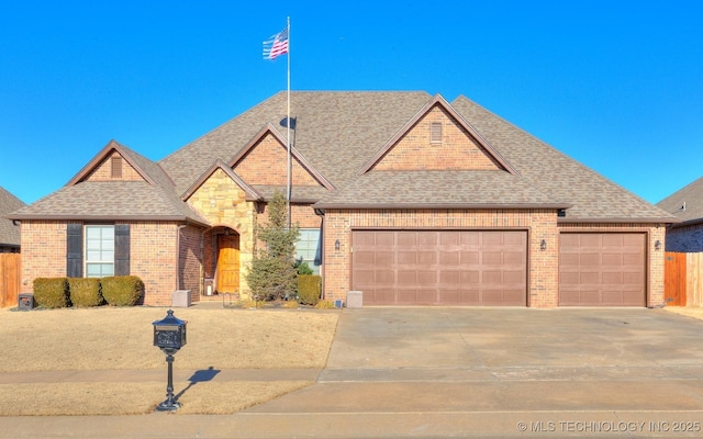 view of front of home featuring a garage