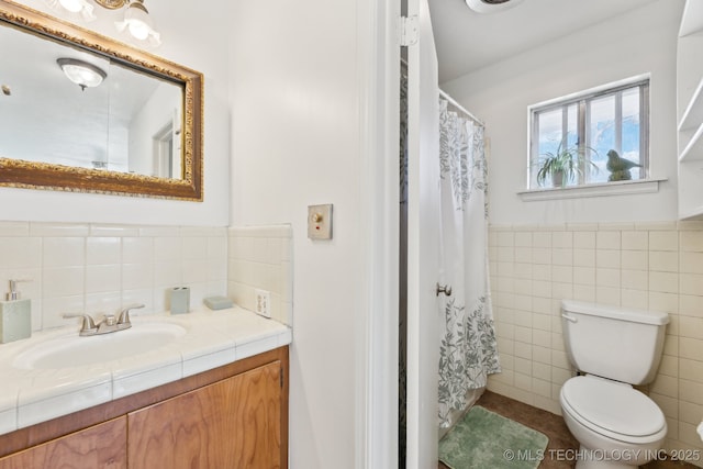 10541 Sahoma Lake Rd, Sapulpa, OK 74066 - bathroom with tile walls, vanity, tile patterned flooring, and a shower with shower curtain