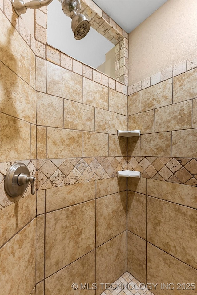 details with a tile shower