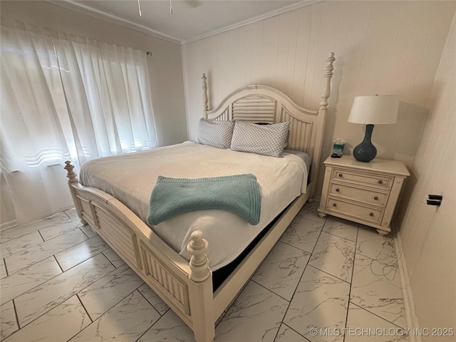 bedroom with crown molding and wooden walls