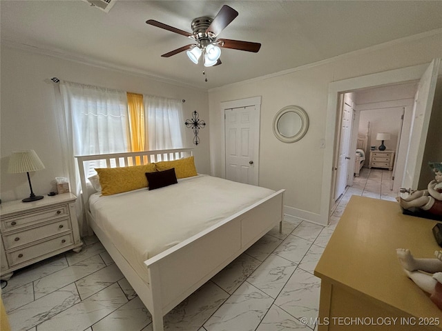 bedroom with ornamental molding, a closet, and ceiling fan