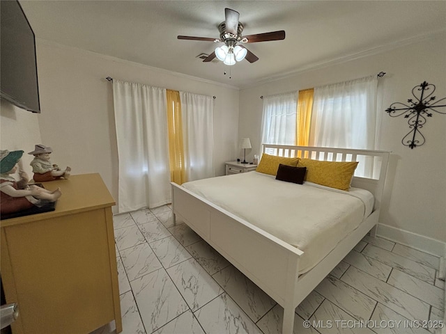 bedroom with crown molding and ceiling fan