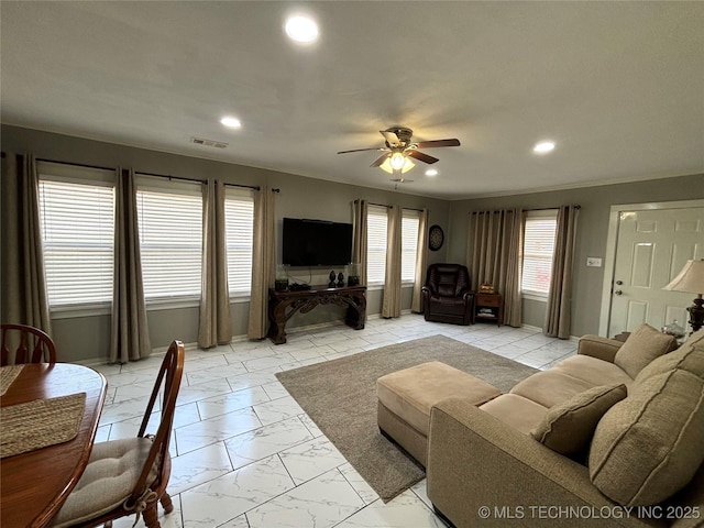 living room featuring ceiling fan