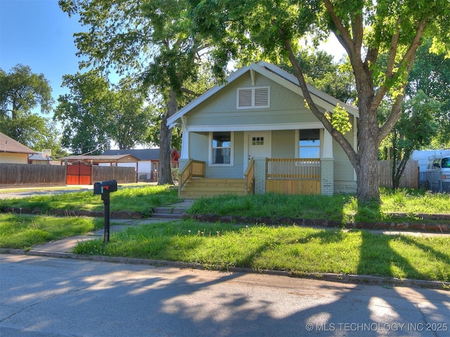 bungalow-style house featuring covered porch