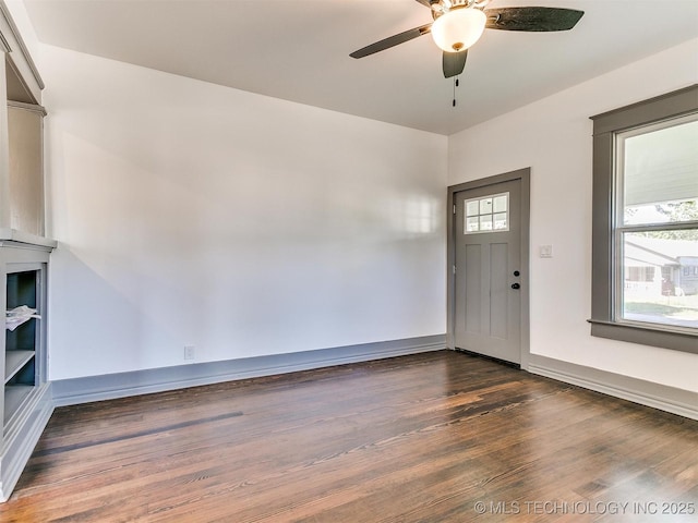 entryway featuring ceiling fan and dark hardwood / wood-style flooring