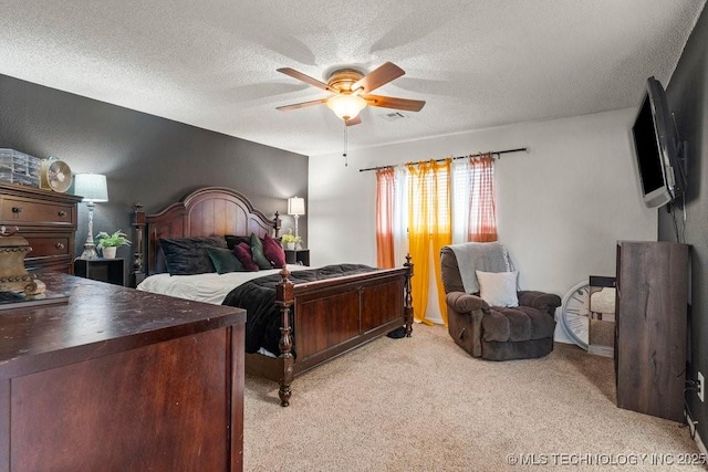 bedroom with light carpet, a textured ceiling, and ceiling fan