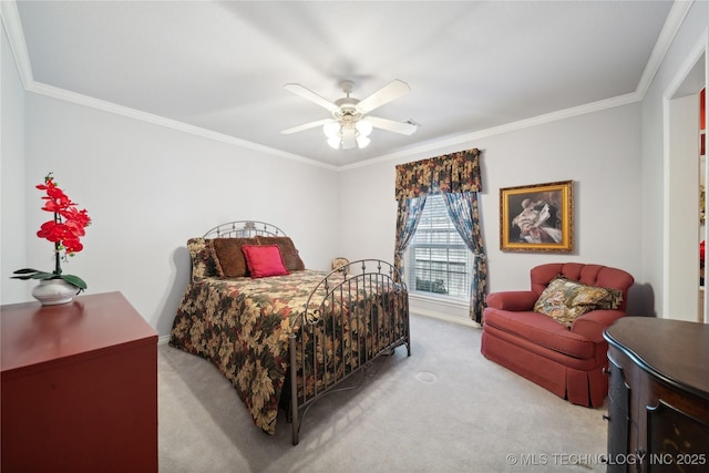 bedroom featuring crown molding, light colored carpet, and ceiling fan