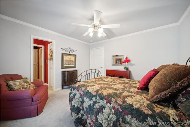 carpeted bedroom featuring crown molding and ceiling fan