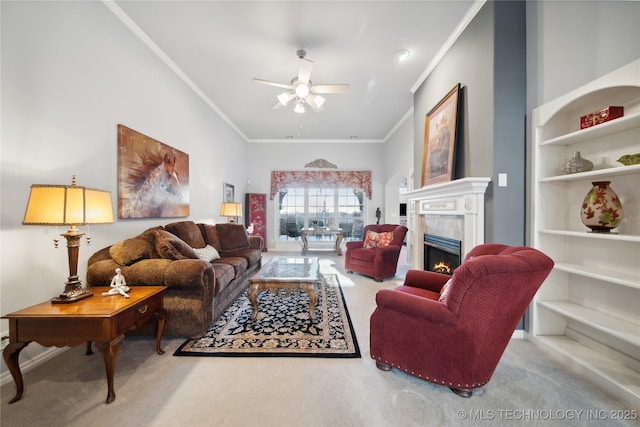 living room with crown molding, ceiling fan, and carpet floors