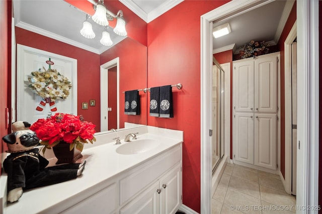 bathroom featuring walk in shower, tile patterned floors, crown molding, and vanity