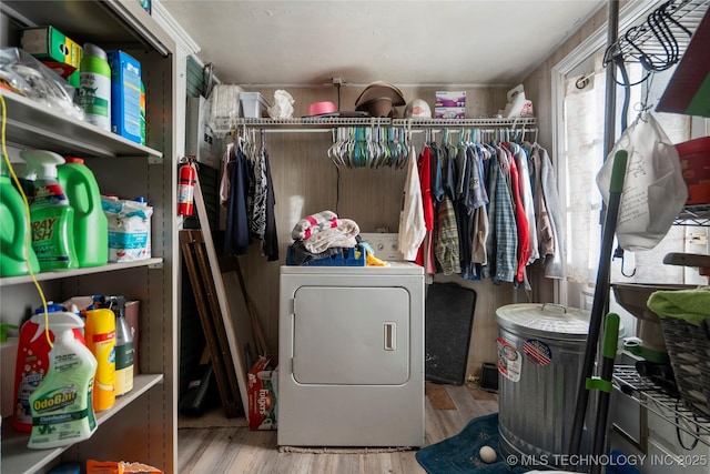 washroom featuring washer / clothes dryer and light hardwood / wood-style floors