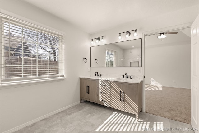 bathroom with vanity, tile patterned floors, and ceiling fan