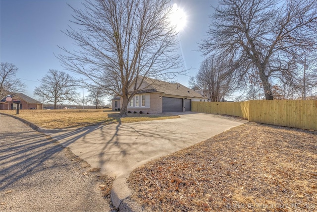 exterior space with a garage