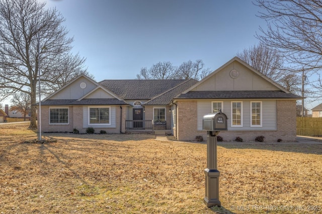 ranch-style house featuring a front lawn