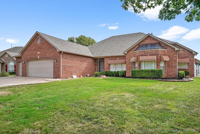 view of front of home with a garage and a front yard