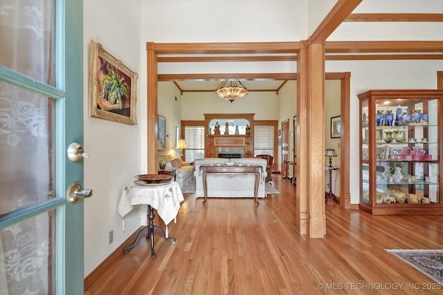 interior space with light hardwood / wood-style floors and a chandelier