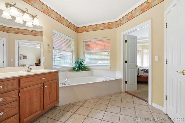 bathroom featuring ornamental molding, tile patterned floors, vanity, and a tub