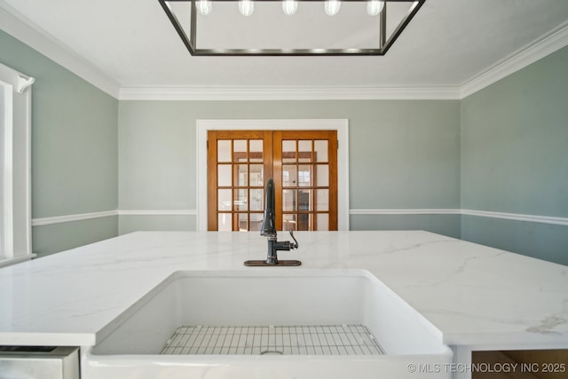 room details with sink, crown molding, and french doors