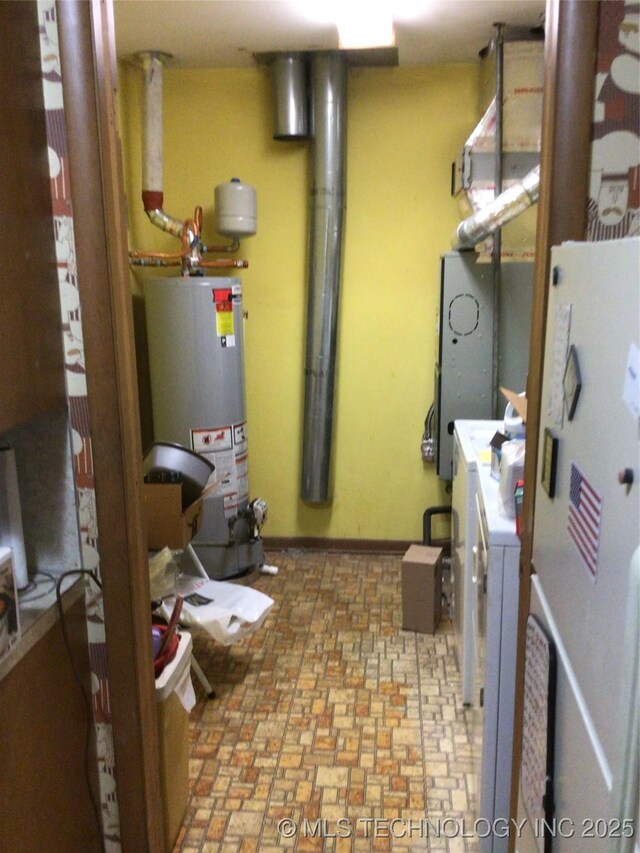 utility room with water heater