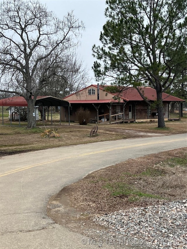 view of front of property with a carport