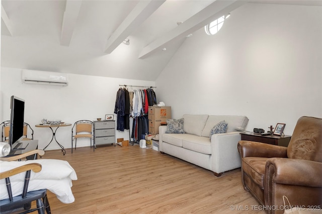 living room with vaulted ceiling with beams, a wall mounted air conditioner, and light hardwood / wood-style floors