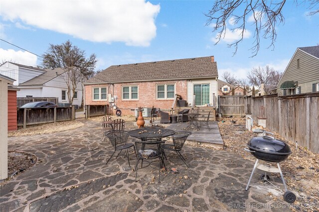 back of house featuring a patio