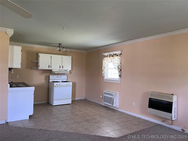 kitchen with white cabinetry, white range with gas cooktop, heating unit, and light tile patterned floors