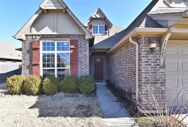 view of exterior entry featuring a garage