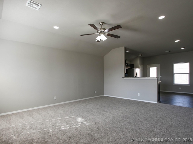 carpeted empty room with ceiling fan