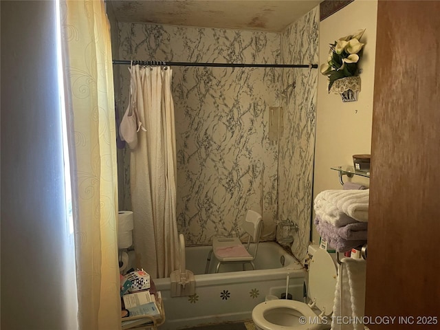 bathroom with shower / bathtub combination with curtain and toilet