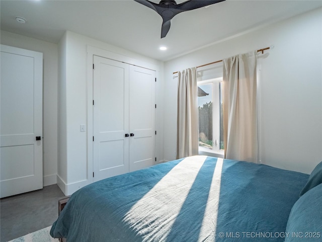 bedroom with a closet and ceiling fan