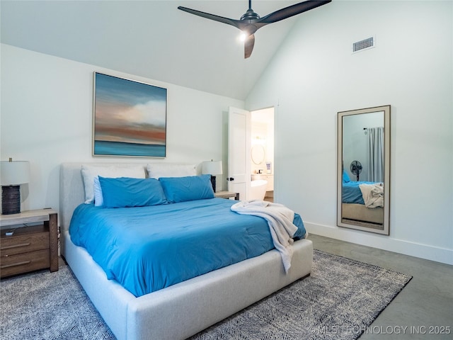 bedroom with ceiling fan, high vaulted ceiling, and ensuite bath