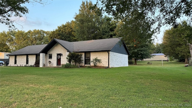 view of front of property with a front lawn