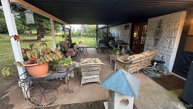 view of patio / terrace featuring outdoor lounge area and french doors