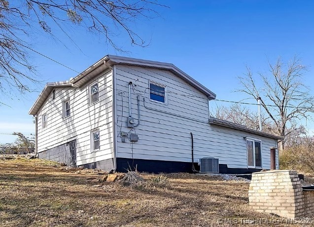 view of property exterior with central air condition unit