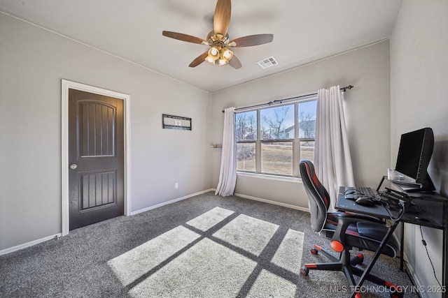 office area with ceiling fan and dark colored carpet