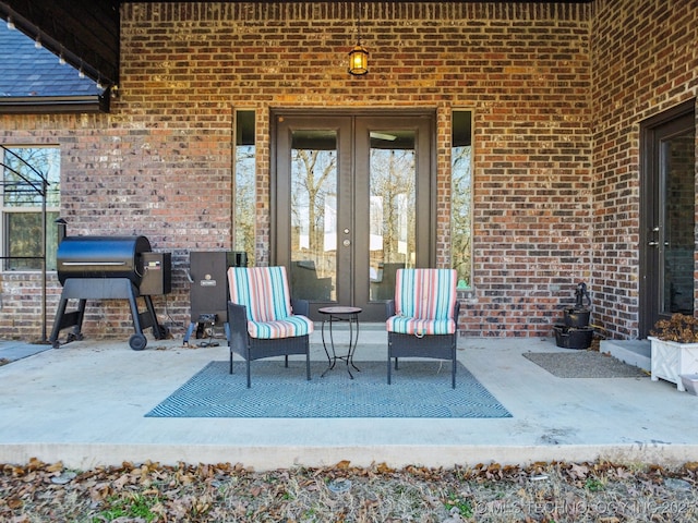 view of patio with french doors and area for grilling