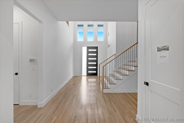 entrance foyer with light wood-type flooring