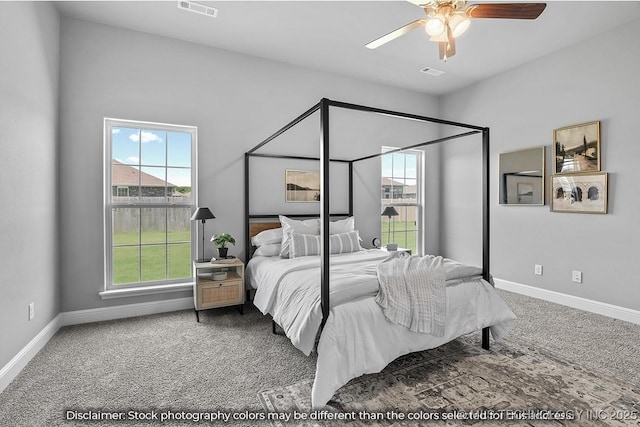 bedroom with ceiling fan and carpet flooring