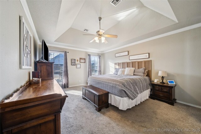 bedroom featuring light carpet, access to exterior, a raised ceiling, and ceiling fan