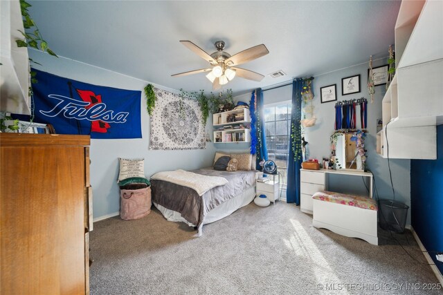 carpeted bedroom with ceiling fan