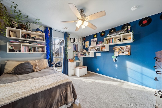 carpeted bedroom with ceiling fan