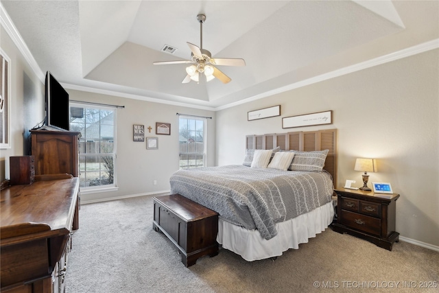 carpeted bedroom featuring access to outside, ornamental molding, a raised ceiling, and ceiling fan