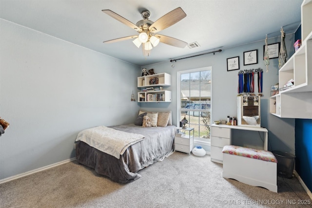 bedroom with light colored carpet and ceiling fan