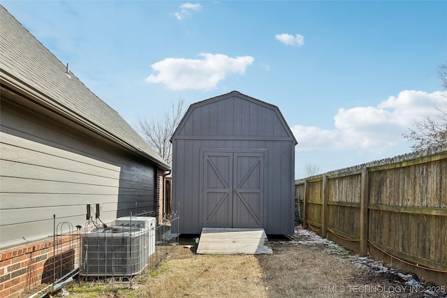 view of outbuilding with central air condition unit