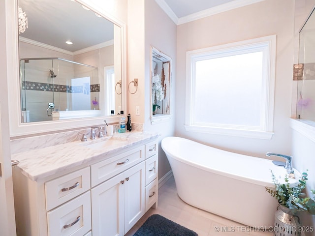 bathroom featuring ornamental molding, separate shower and tub, and vanity