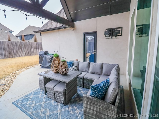 view of patio featuring a grill and an outdoor hangout area