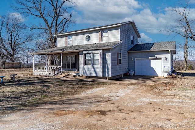 432756 E 320th Rd, Big Cabin, OK 74332 - traditional-style house featuring a porch, a garage, dirt driveway, and a shingled roof